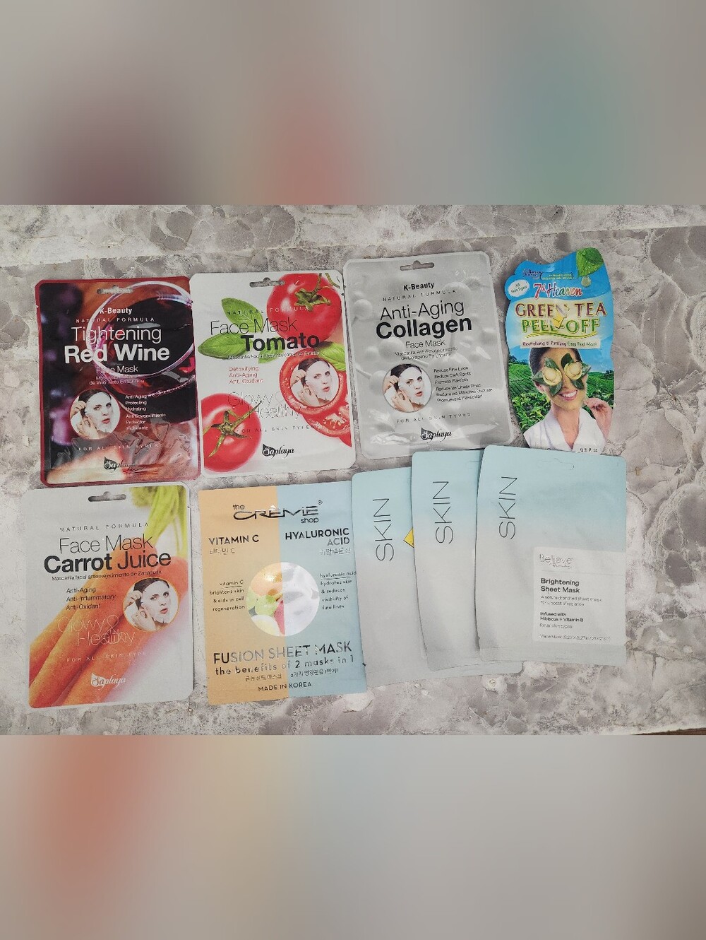 Assorted Sheet Mask Pack - Light Blue, Red, White, Green. 9 Masks Included.